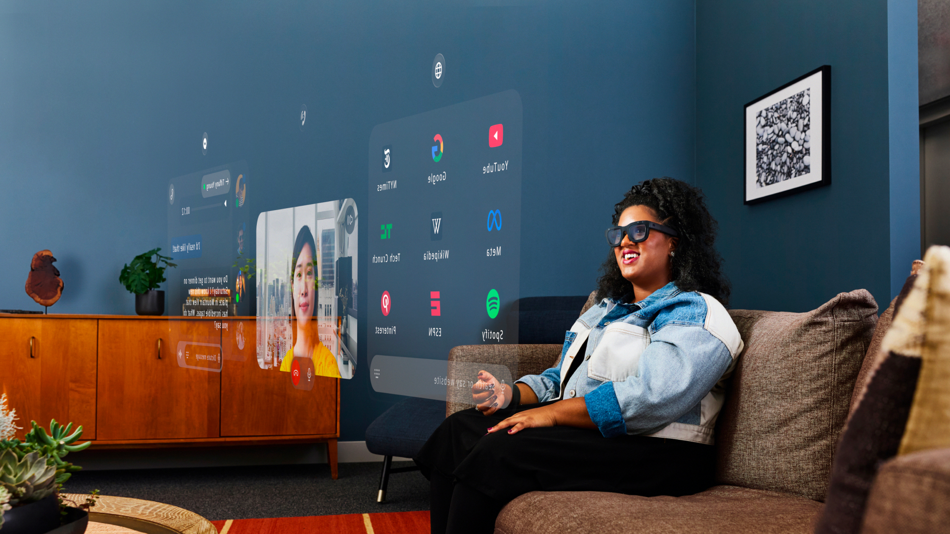 Meta Orion AR glasses with floating UI in a living room